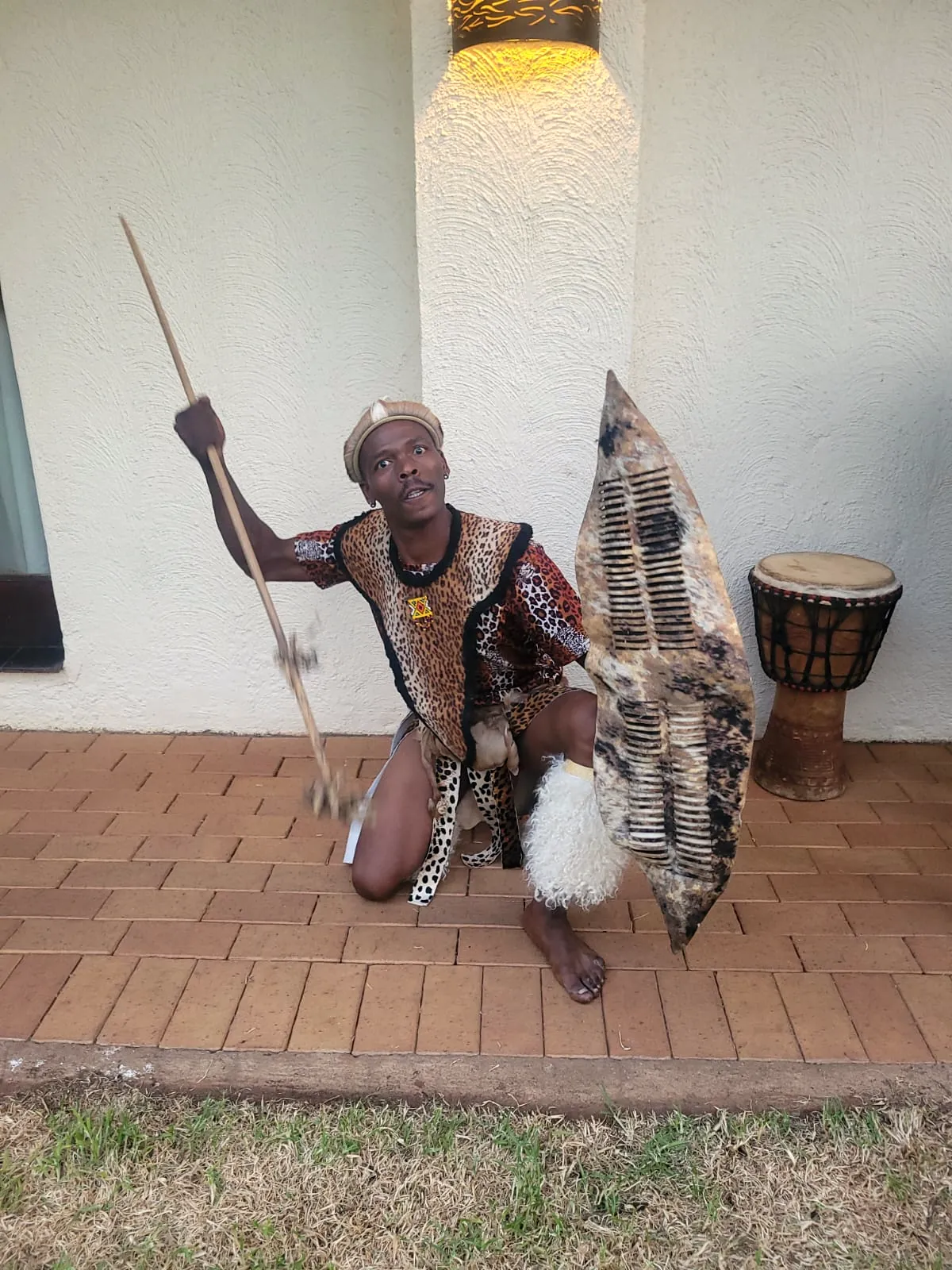 A dancer with shield and spear