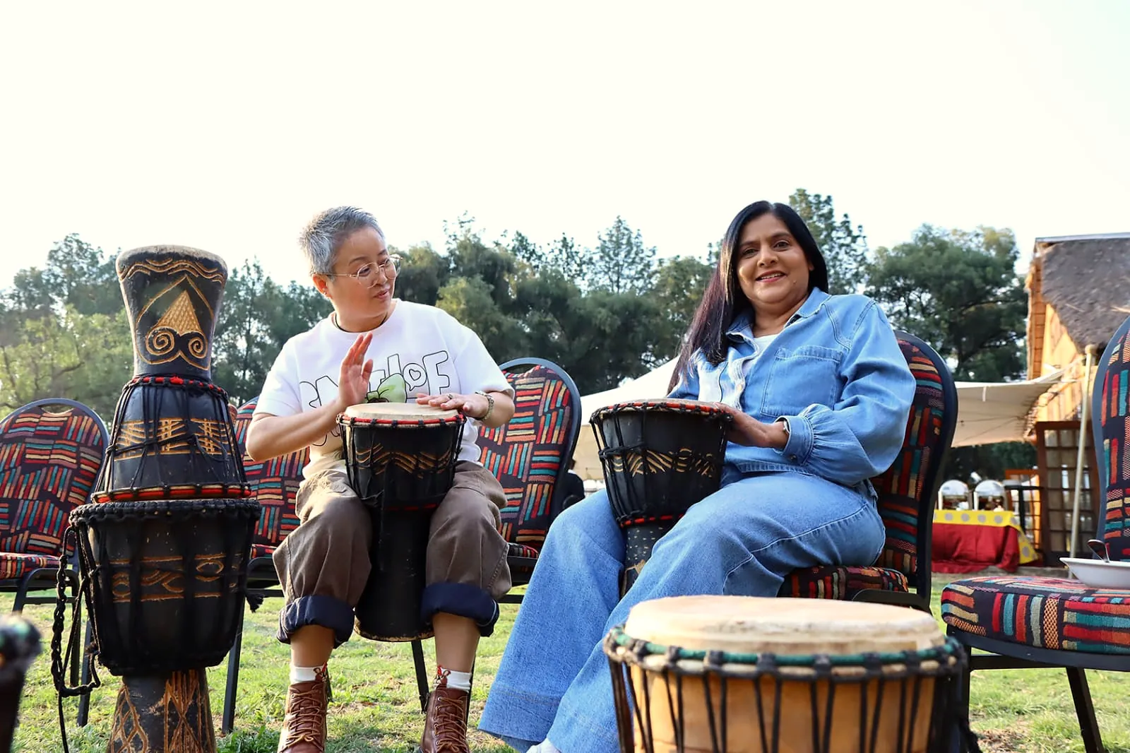 Guests drumming together