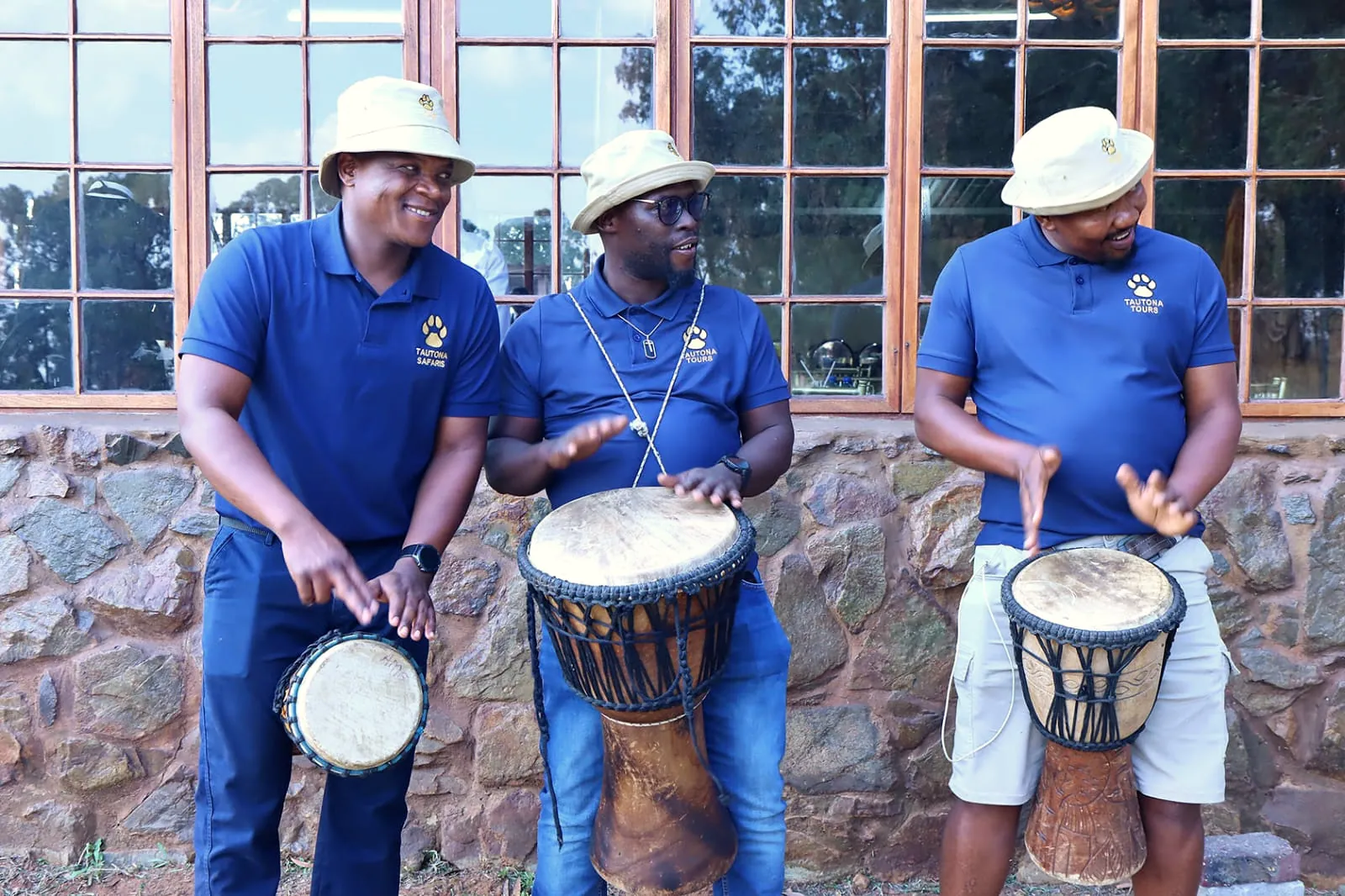 Tautona drummers in blue shirts