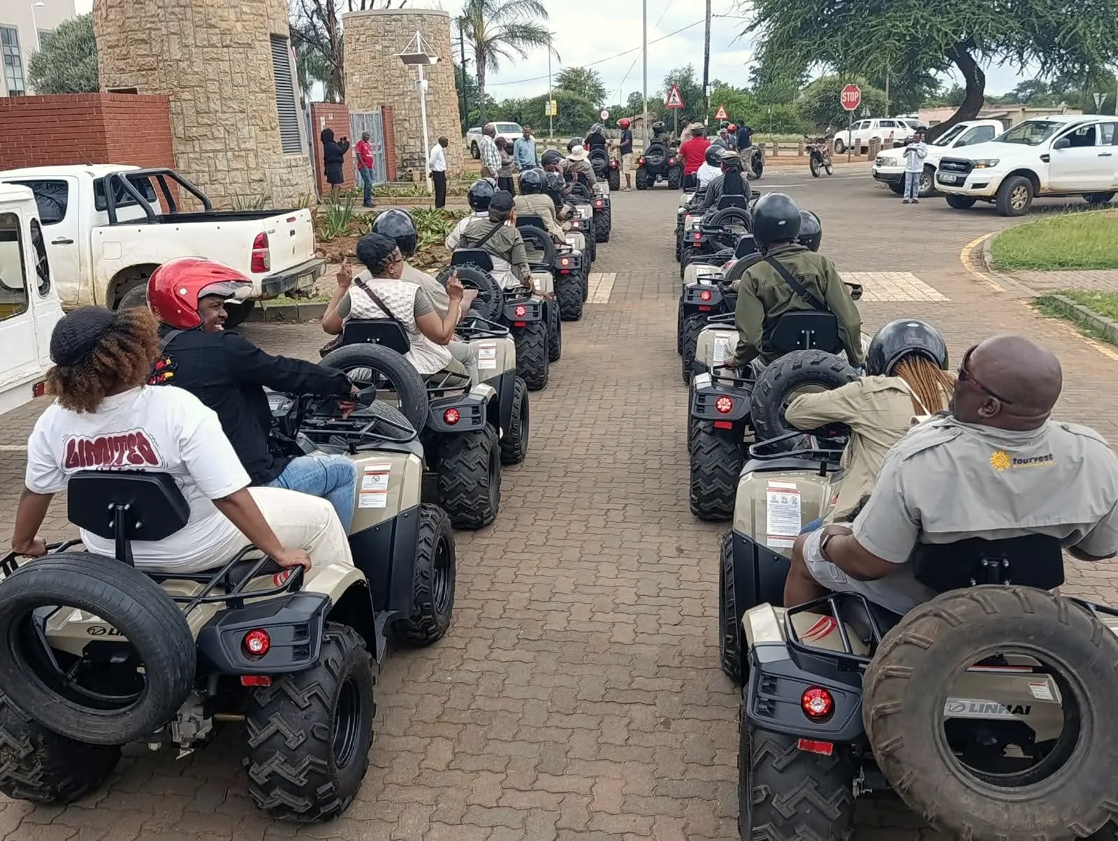 A long line of quad riders setting off