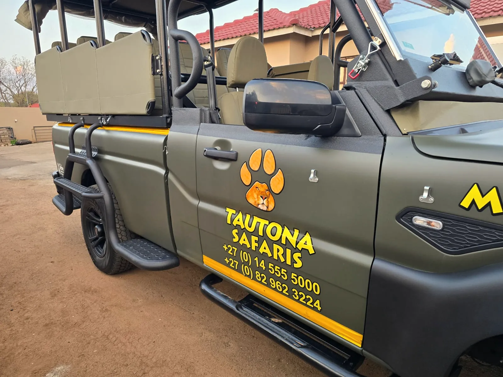 Tautona livery on the game vehicle door